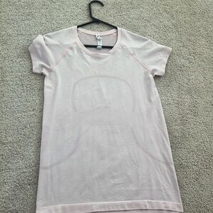 The cutest light pink shirt from Lululemon